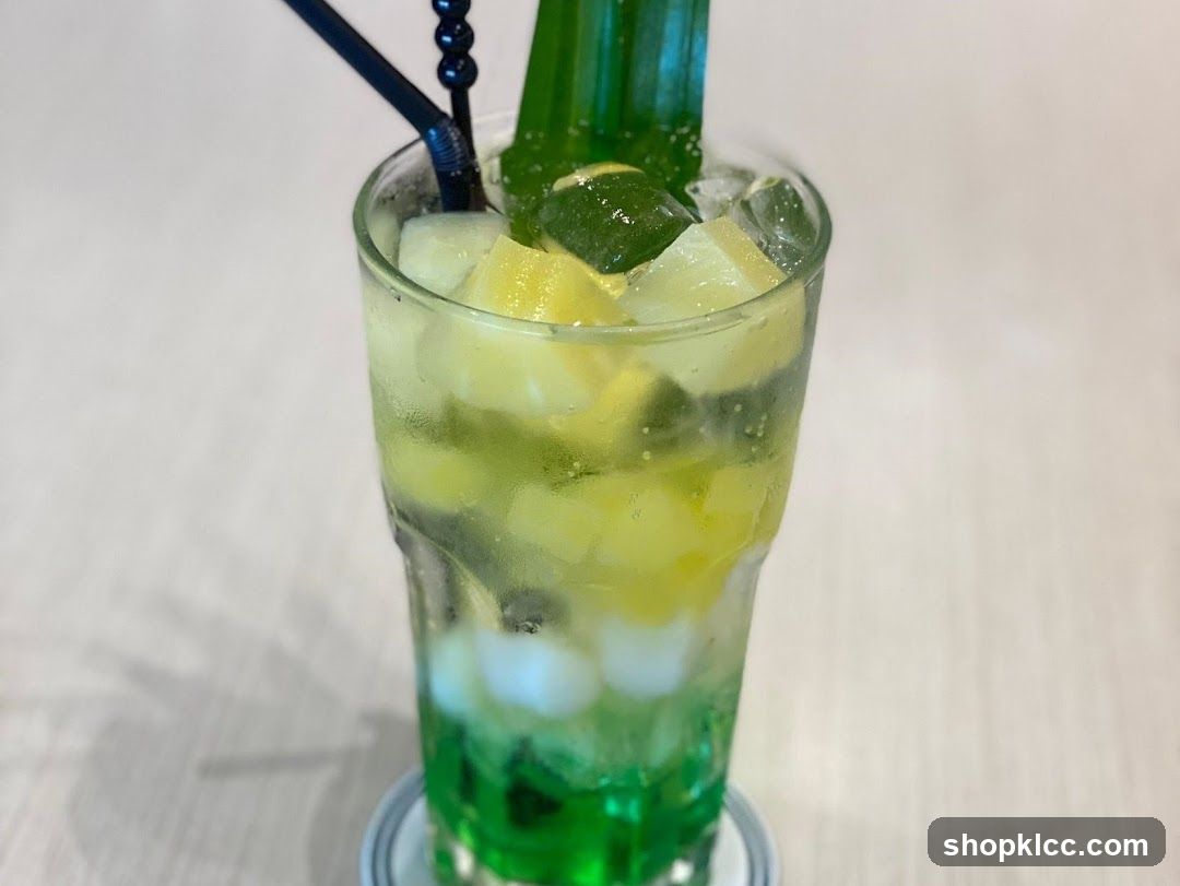 Refreshing Green Drink with Fruit and Ice