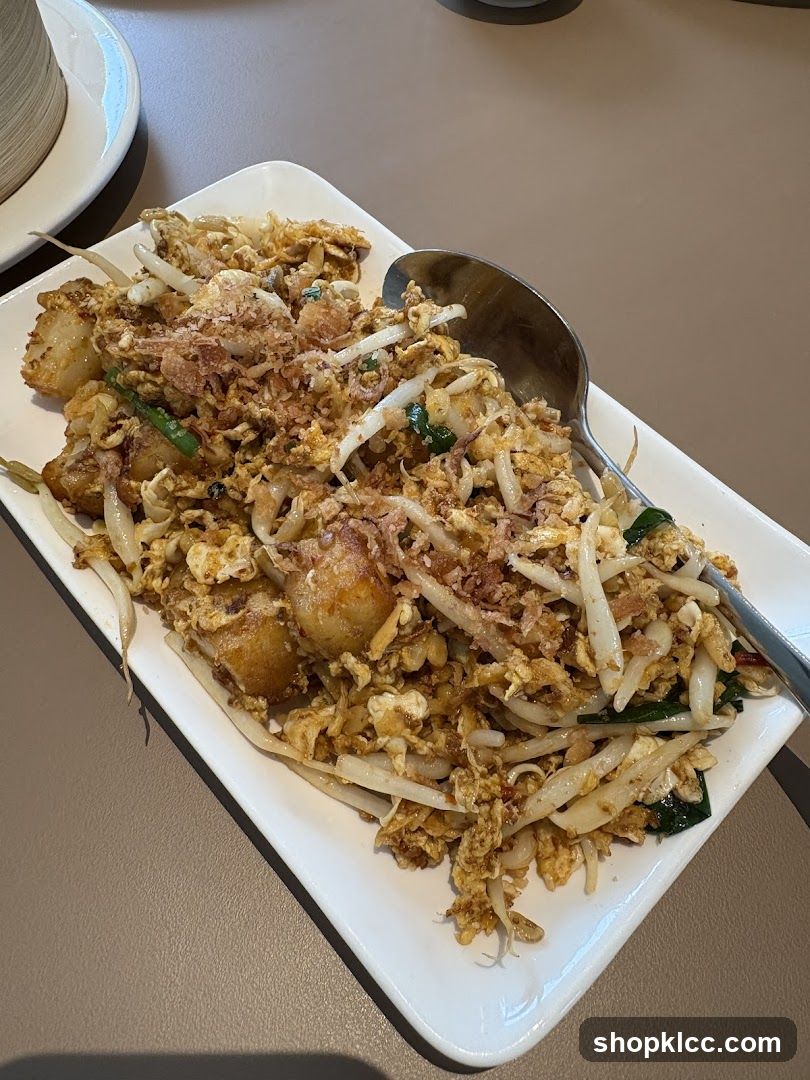 Fried Turnip Cake with Eggs and Bean Sprouts