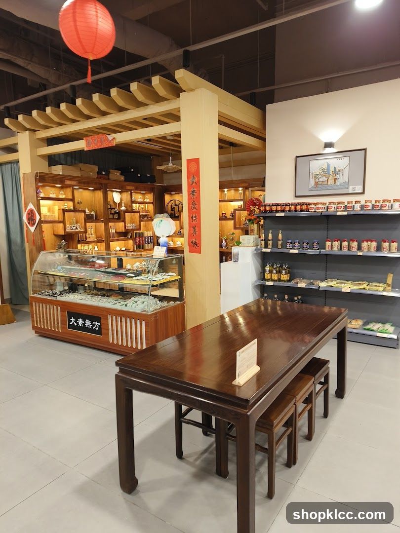 Interior of a shop with display shelves and a table
