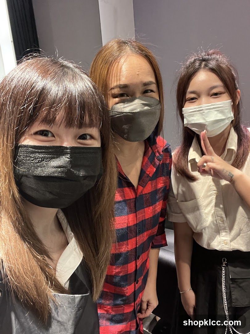 Three women wearing masks
