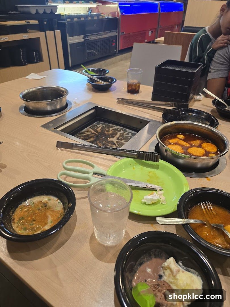 Table with Hot Pot and Desserts