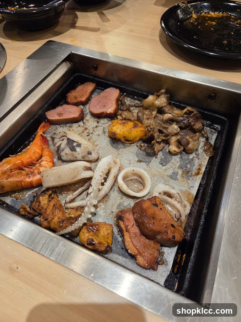 Grill with various meats and seafood