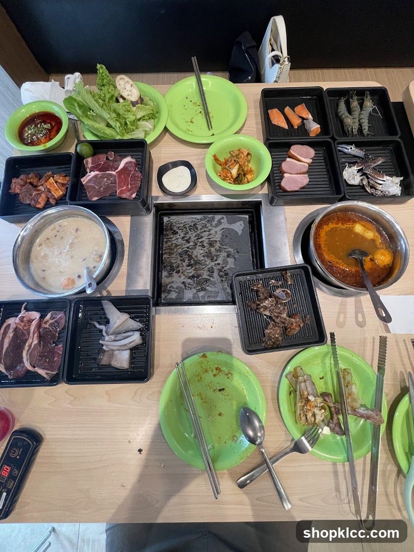 Table with Food and Grilling Equipment