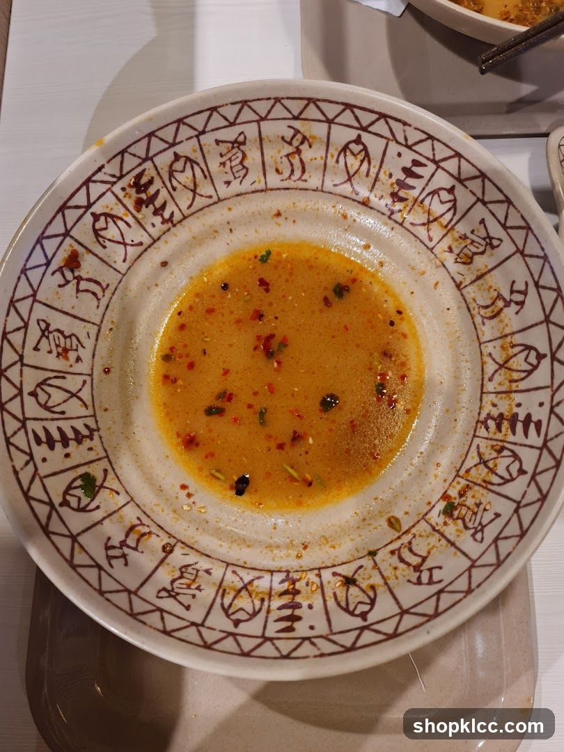 Partially Eaten Bowl of Soup
