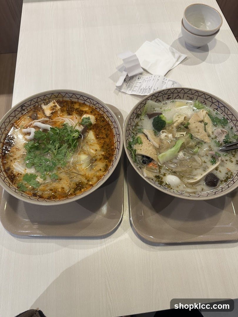 Two bowls of soup on a table