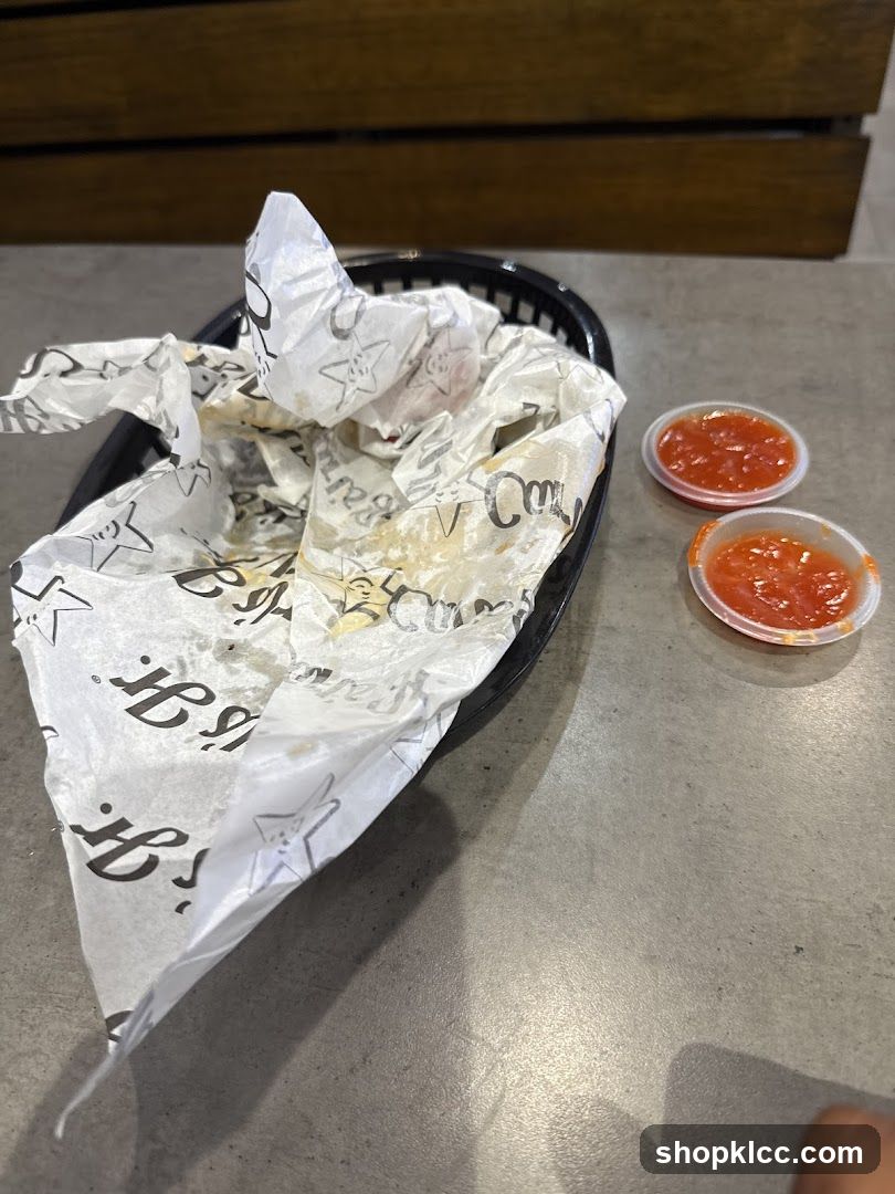 Food basket with wrappers and dipping sauces