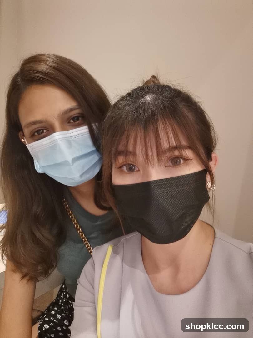 Two women wearing face masks