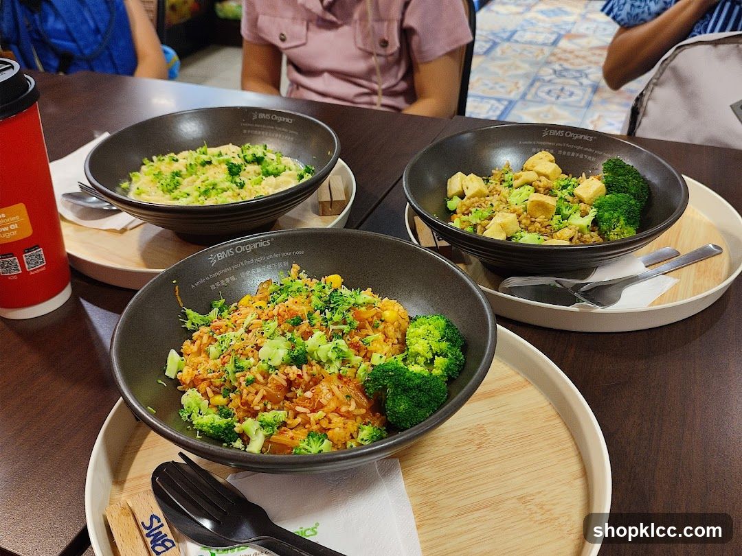 Three bowls of food on a table