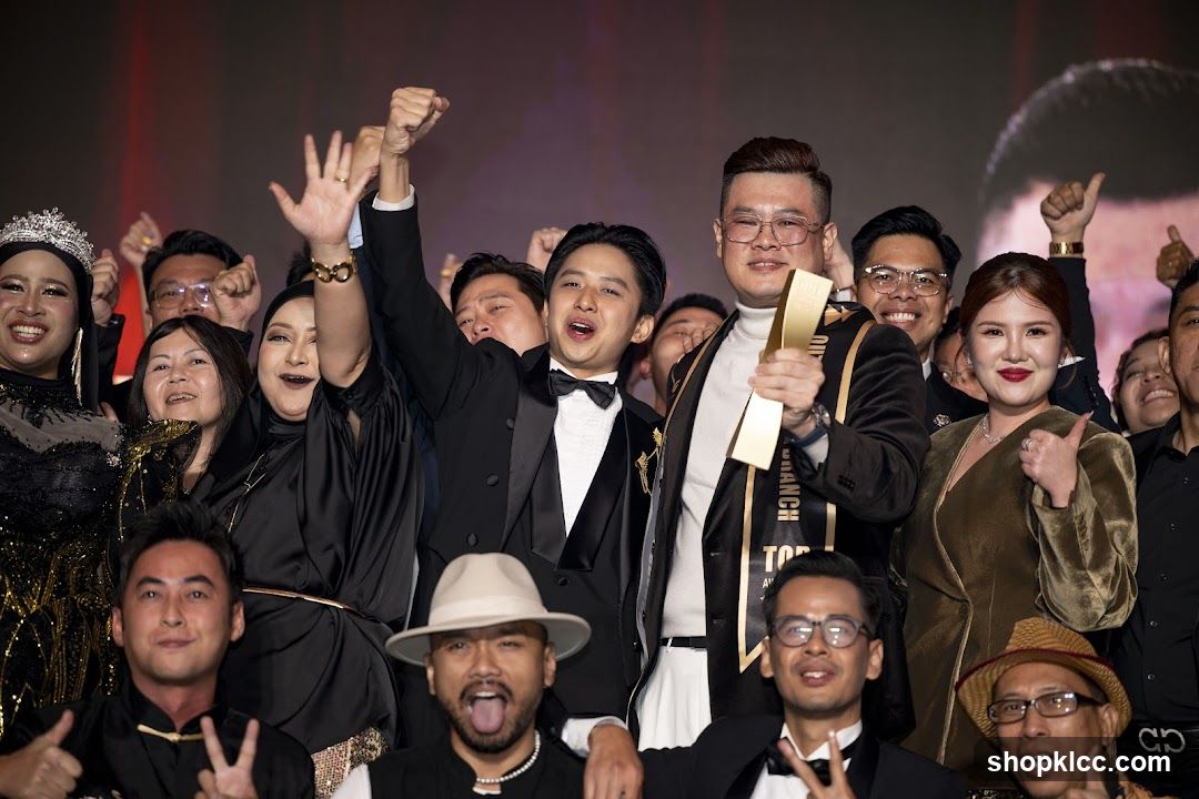 Group celebrating an award