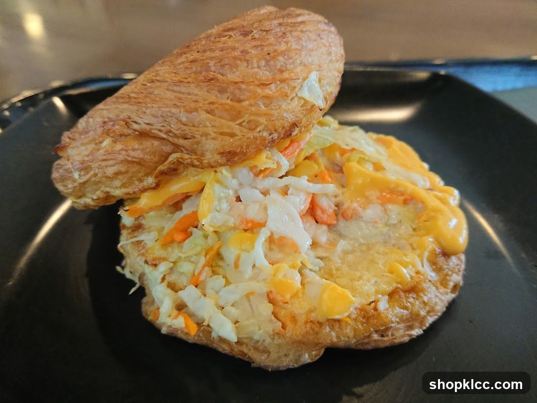 Croissant Sandwich with Coleslaw and Cheese