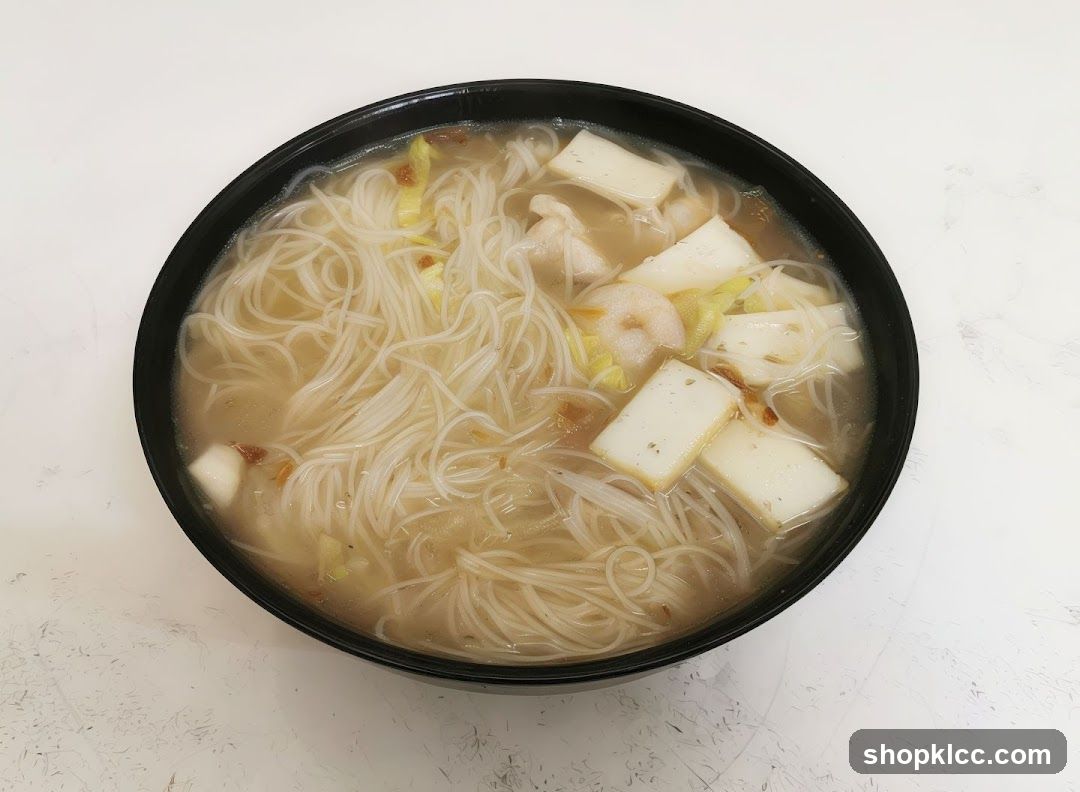 Bowl of Noodle Soup with Tofu and Shrimp