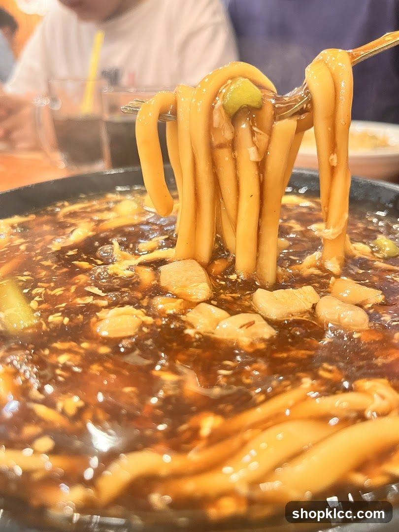 Spicy Noodle Dish with Fork Lift
