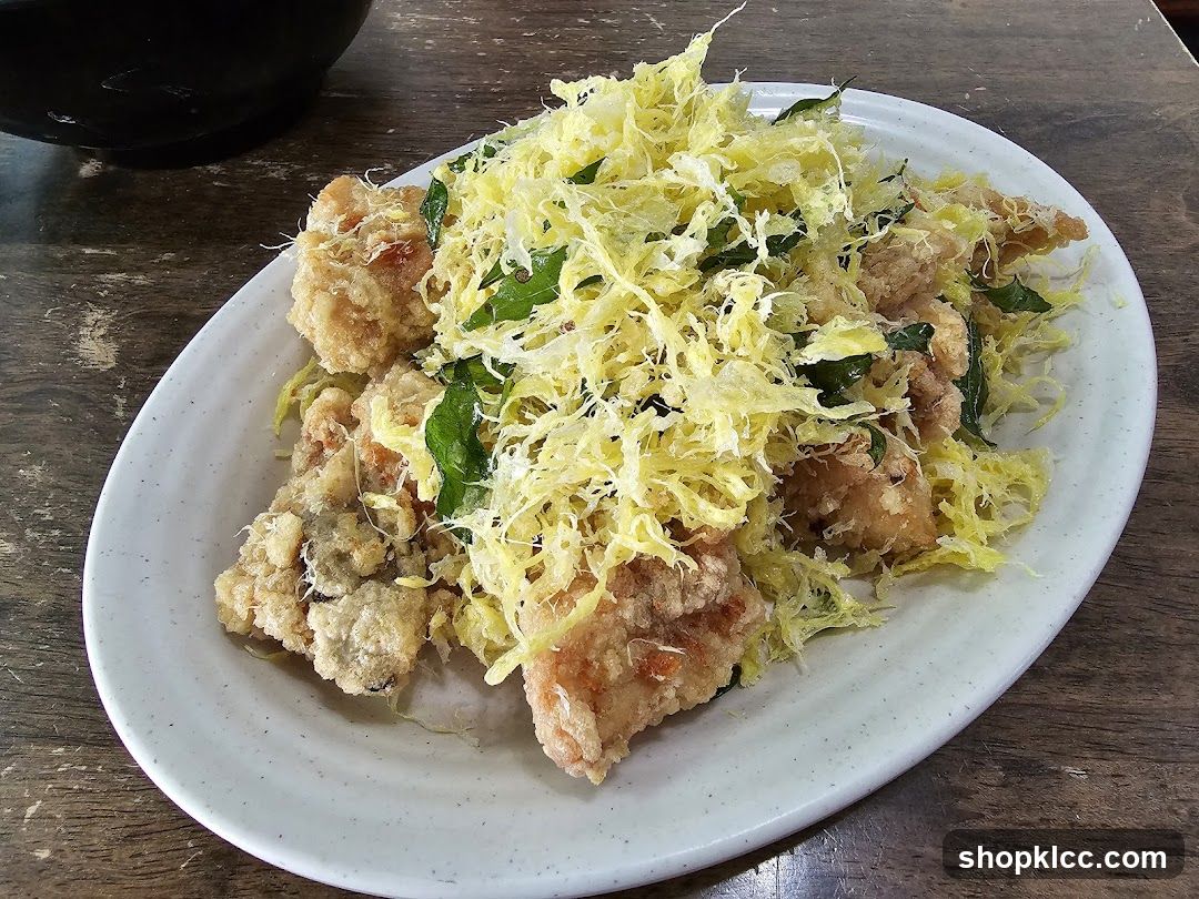 Fried Fish with Shredded Cheese Topping