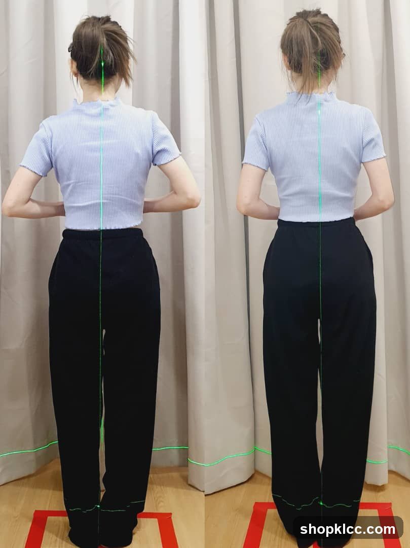 Back view of a woman in striped shirt and black pants