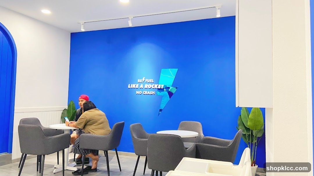 Cafe Interior with Blue Wall and Seating