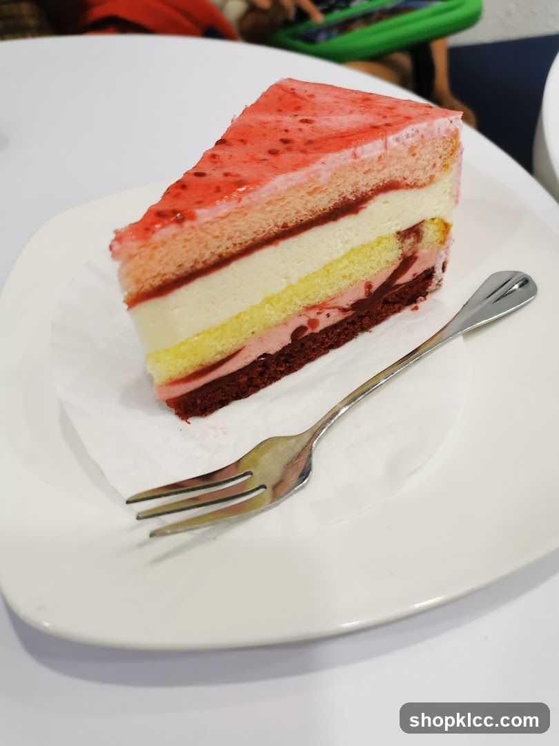 Slice of layered cake with fork