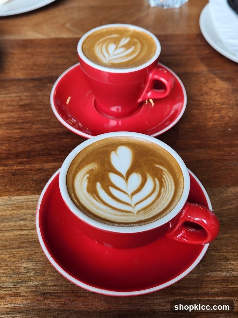 Two coffees with latte art