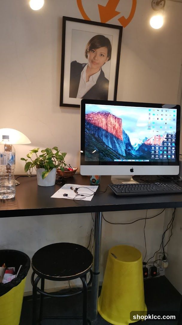 Desk with Computer and Portrait