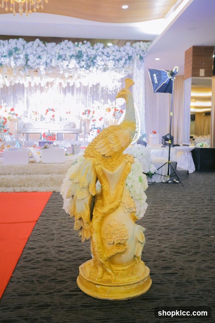 Golden Peacock Statue at Event