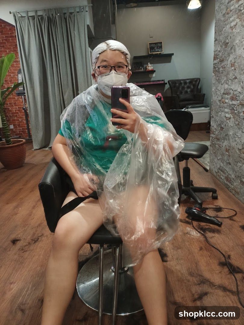 Person getting hair dyed