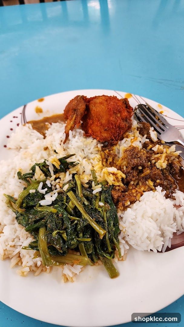 Plate of Rice with Fried Chicken and Vegetables