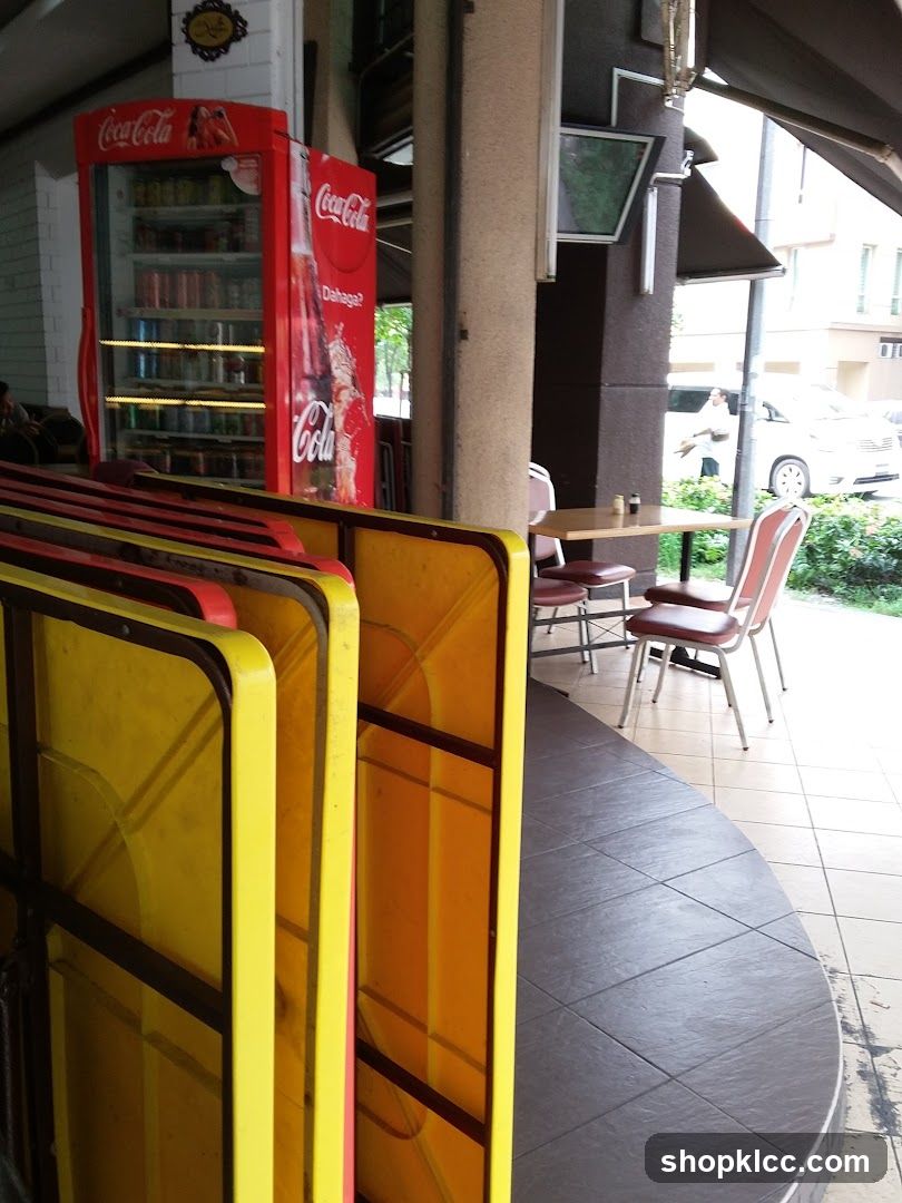 Outdoor Seating Area with Coca-Cola Refrigerator