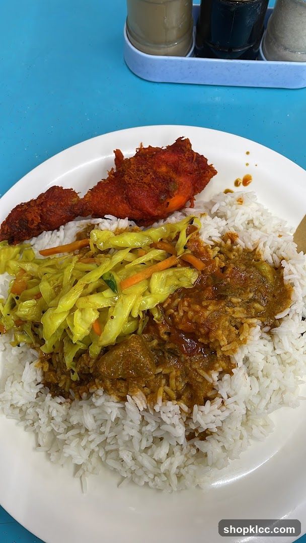 Plate of Rice with Fried Chicken and Vegetables