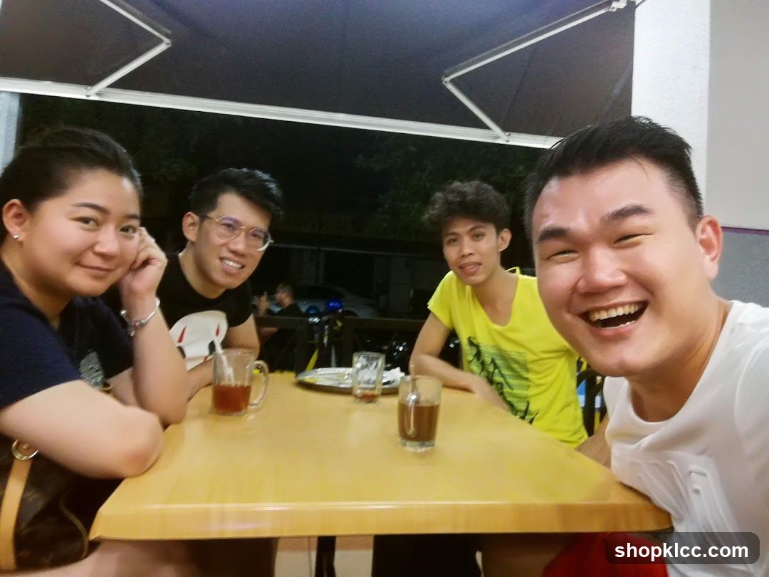 Four friends at a table
