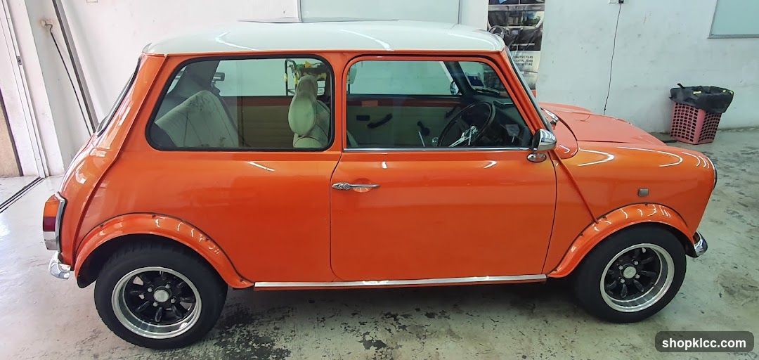 Orange Mini Cooper in Garage