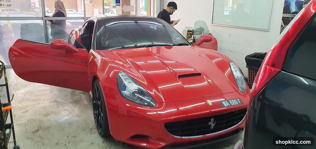 Red Ferrari in Workshop