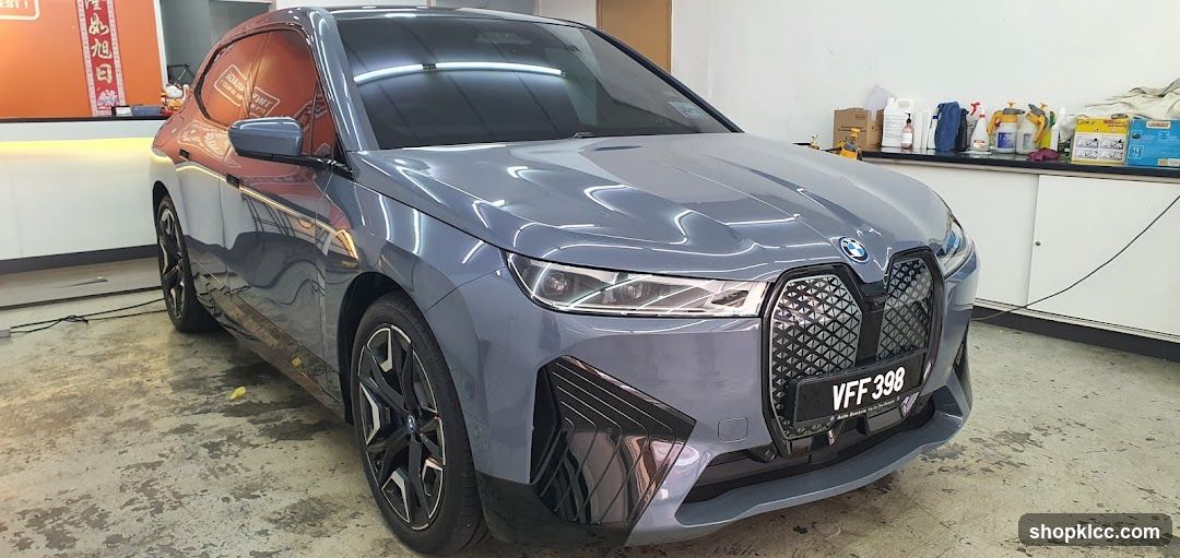 BMW iX in a workshop or detailing shop