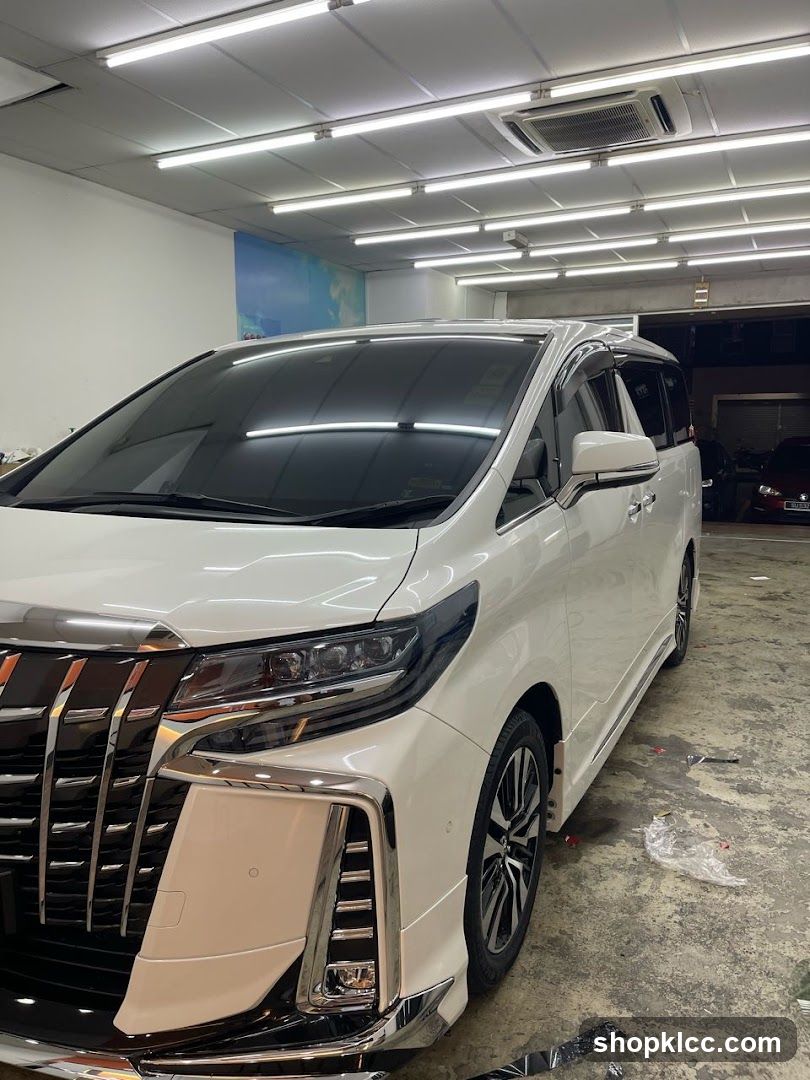 White Toyota Alphard in Workshop