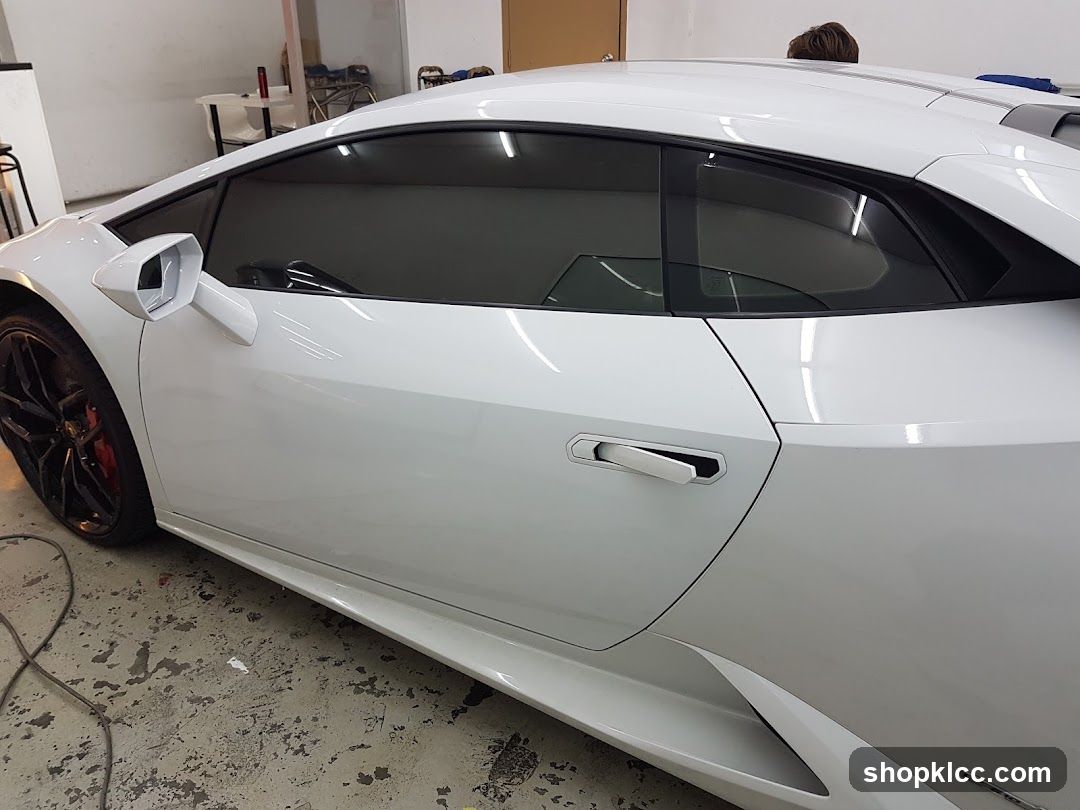 White sports car in workshop