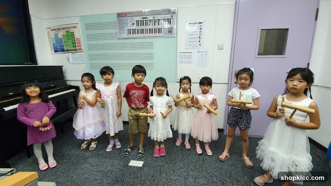 Children with Maracas in Classroom