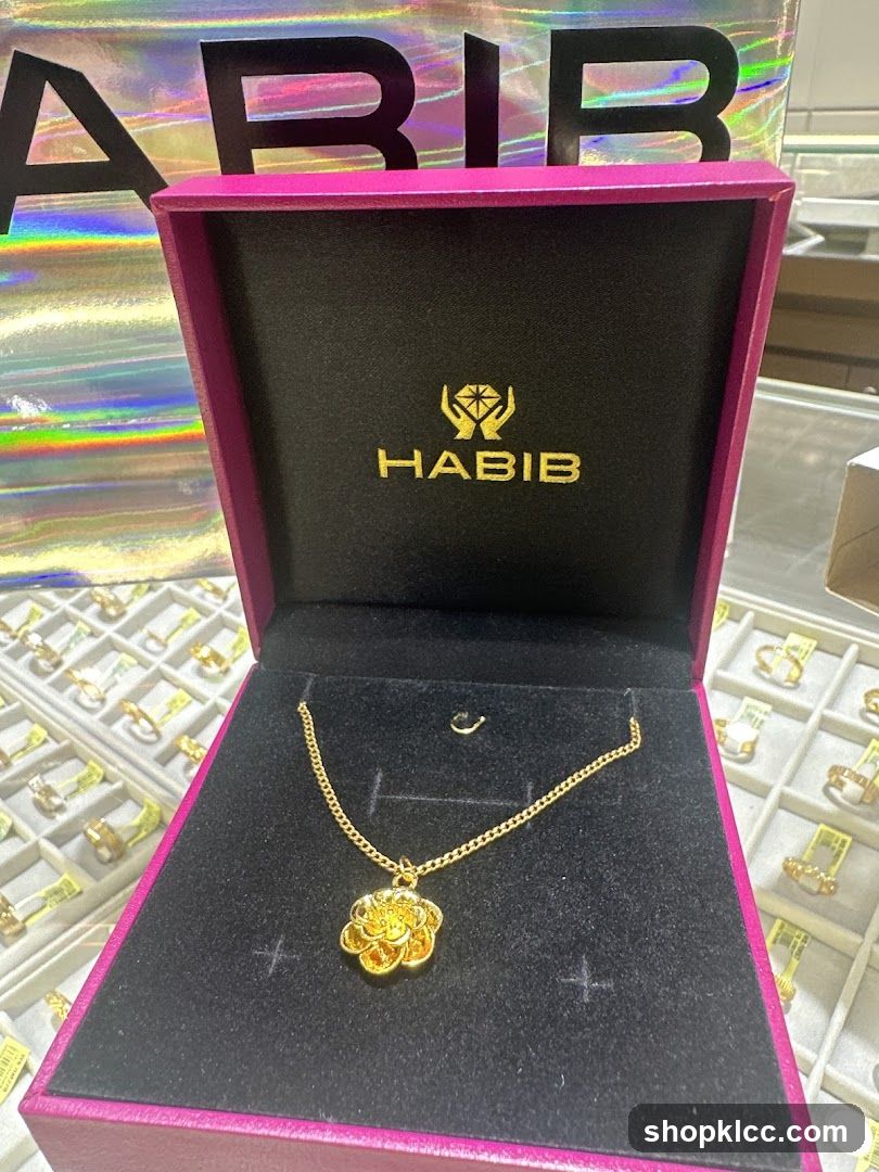 Gold Flower Pendant Necklace in a Jewelry Box