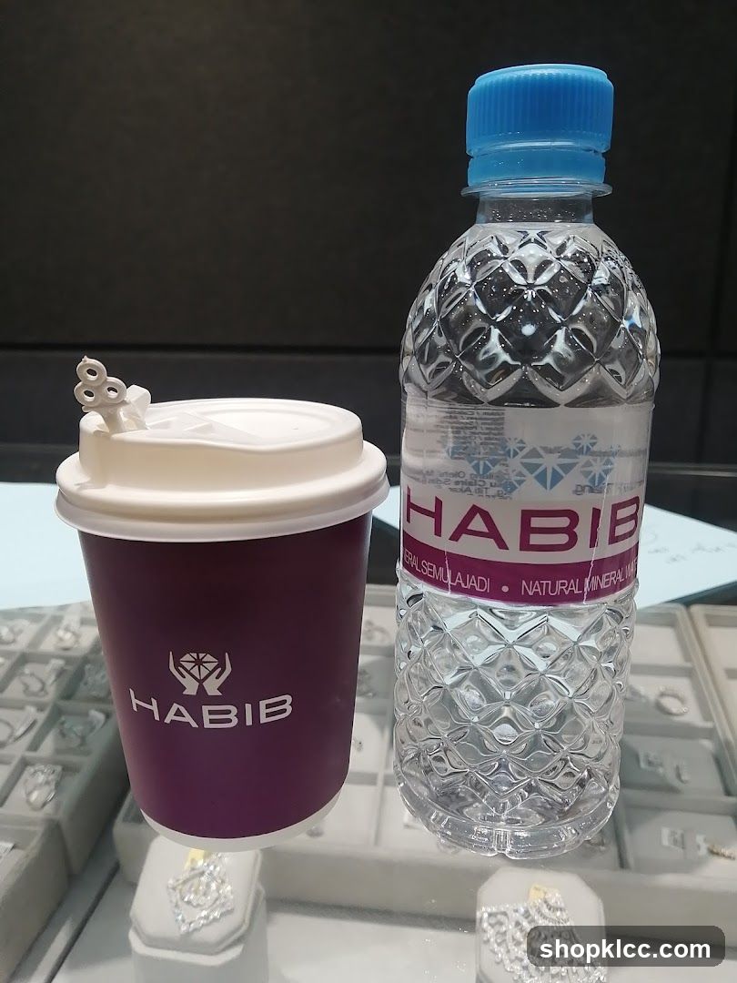 Habib branded coffee cup and water bottle