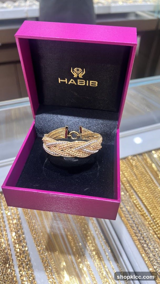 Gold and diamond bracelet in a box