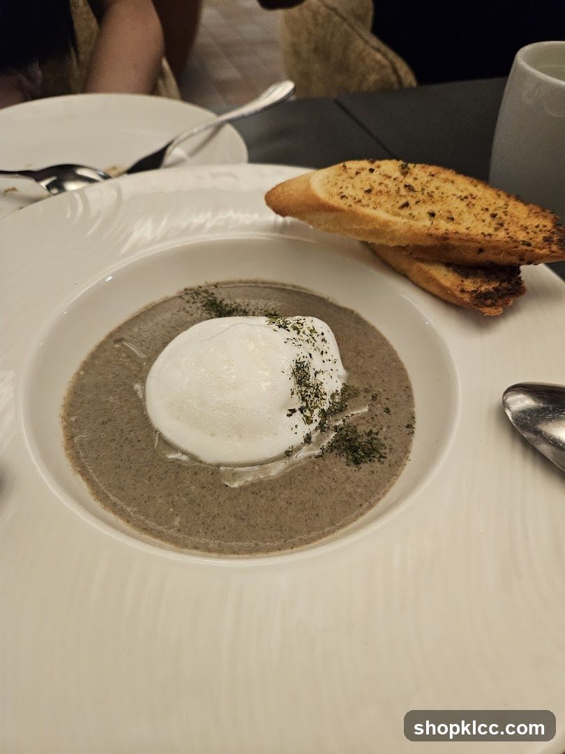 Mushroom Soup with Poached Egg and Garlic Bread