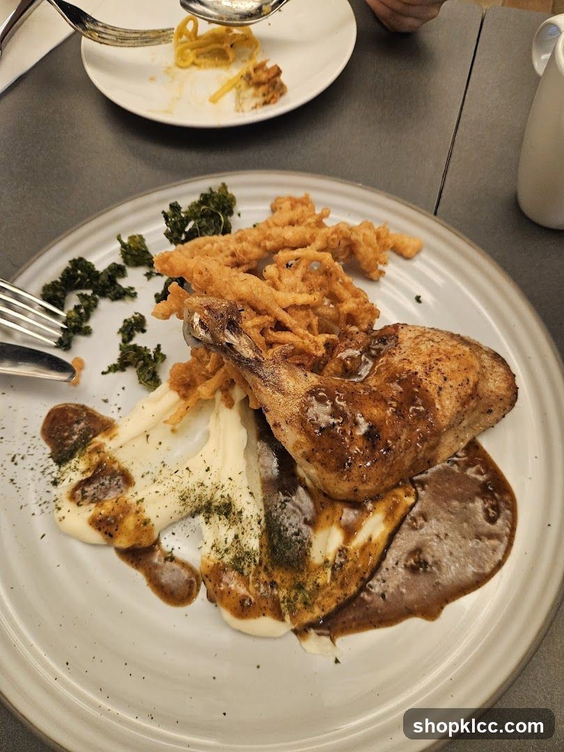 Chicken Dish with Mashed Potatoes and Fries