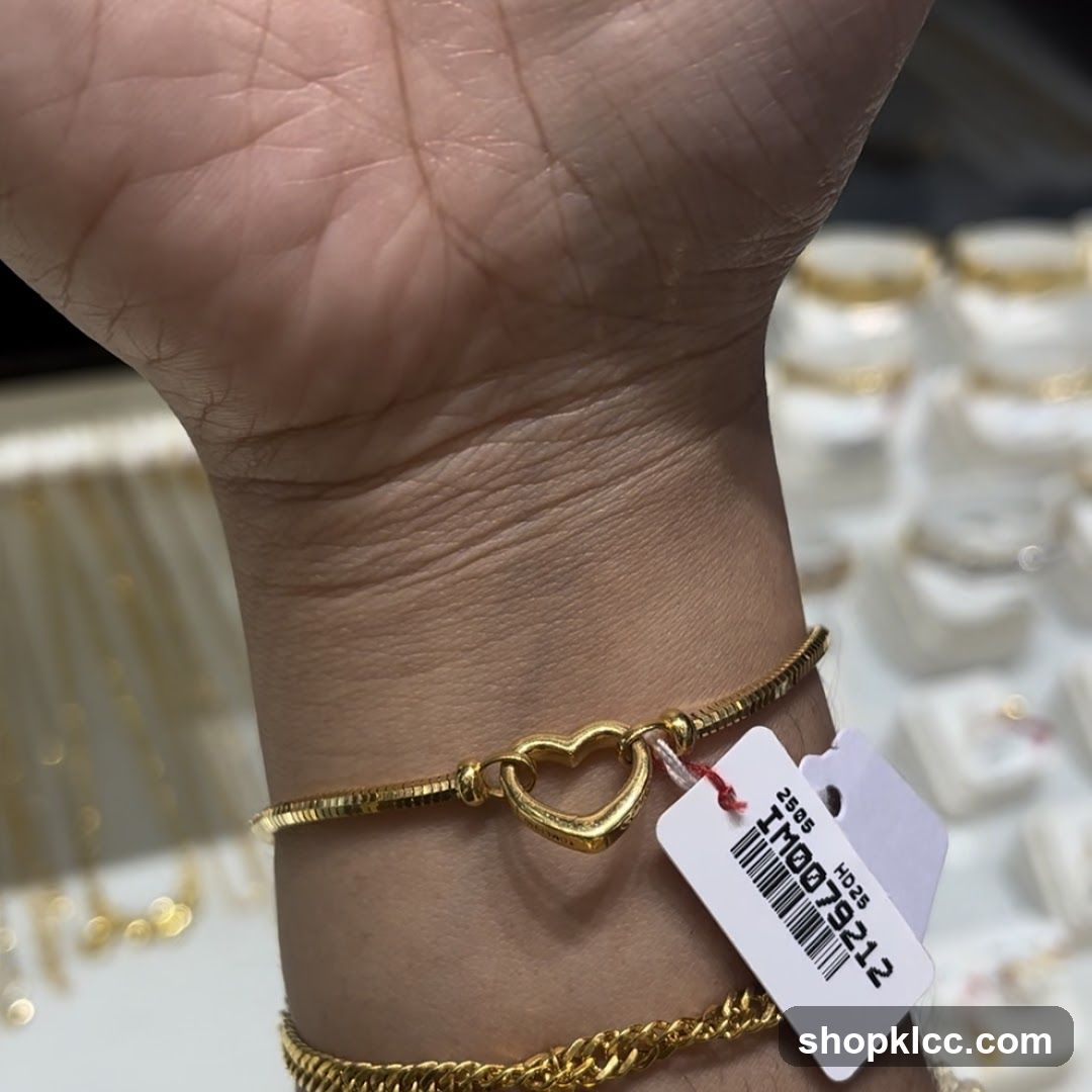 Gold Bracelet with Heart Charm