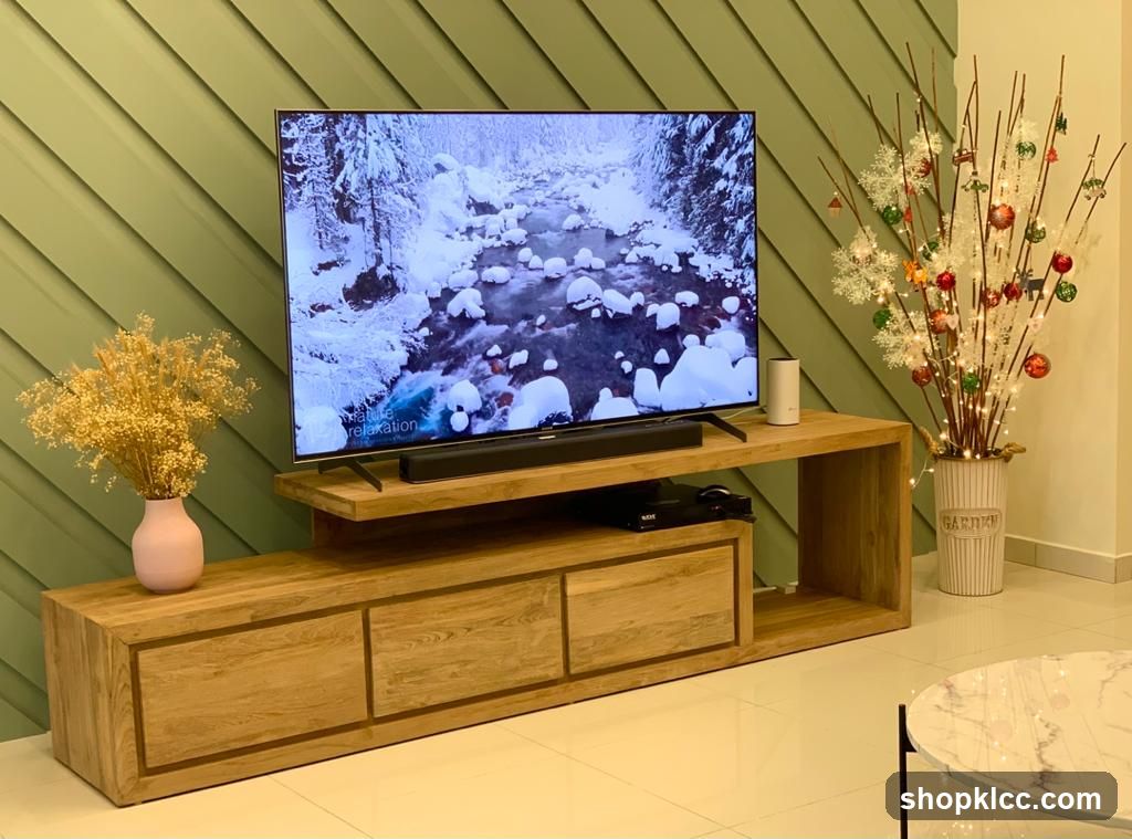 Living room entertainment center with nature scene on TV