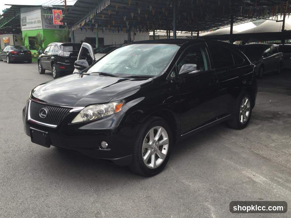 Black Lexus SUV in parking lot