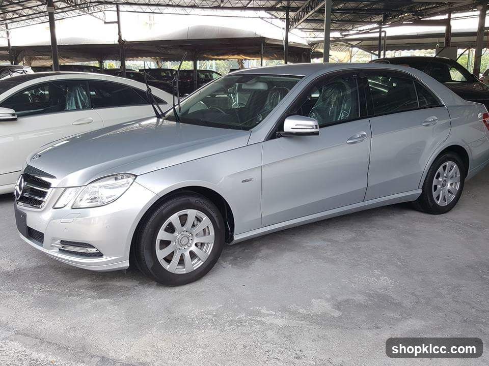 Silver Mercedes E-Class Sedan in Car Lot
