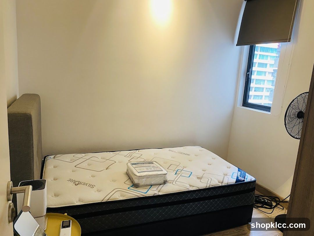 Bedroom Interior with Mattress and Fan