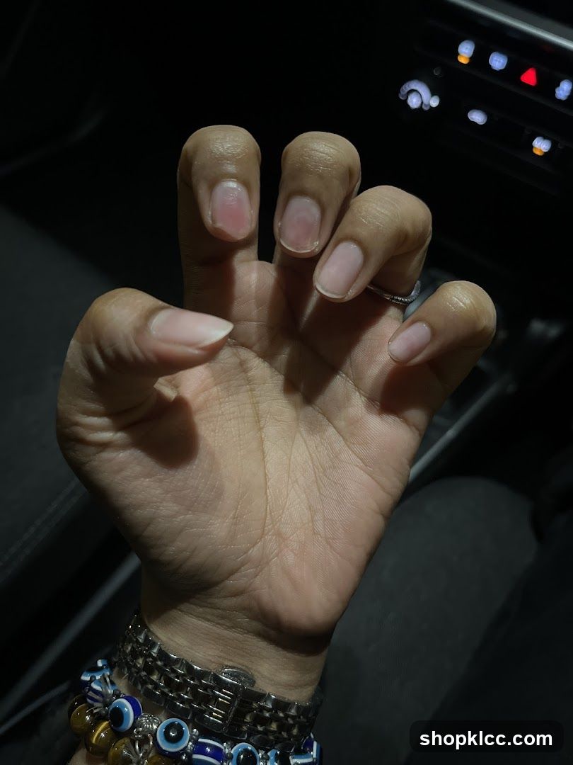 Hand in car interior