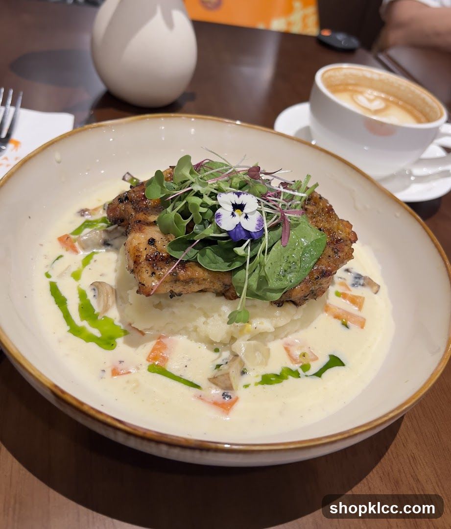 Chicken dish with mashed potatoes and sauce