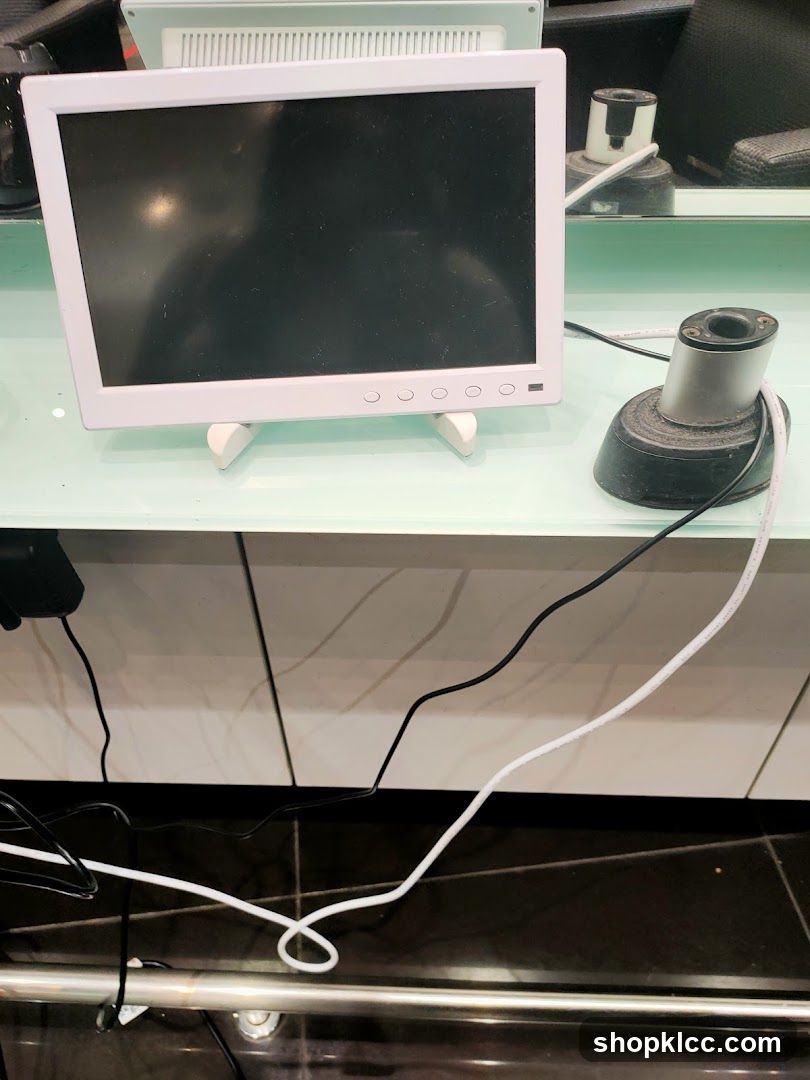 Computer monitor and accessories on a desk