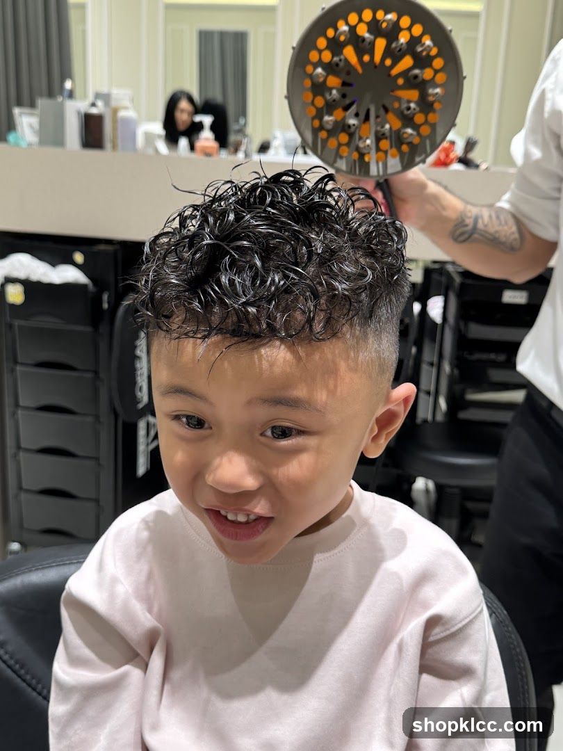 Child getting hair styled