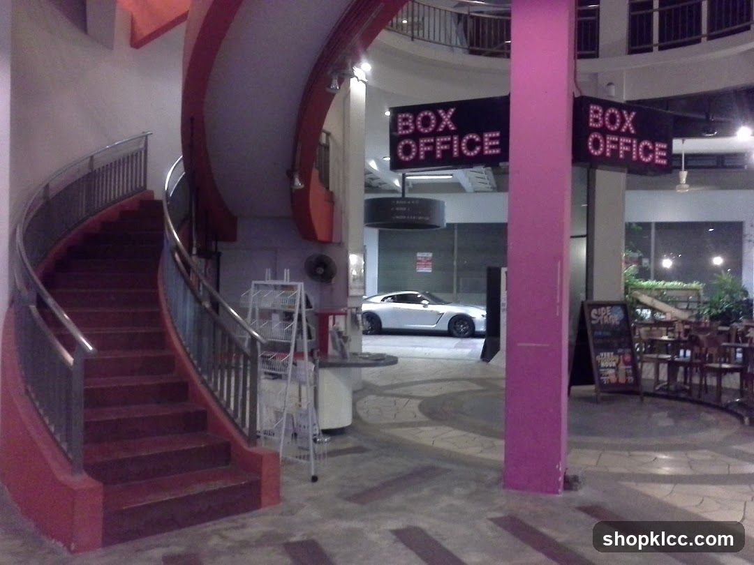Interior Lobby with Staircase and Signage