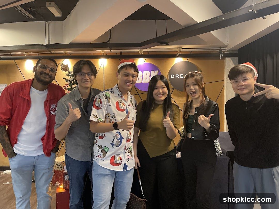Group photo indoors with festive decorations